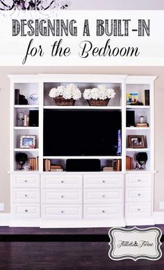 a white entertainment center with built in bookshelves