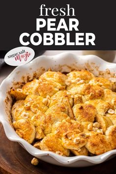 a casserole dish with fresh pear cobbler in the middle and text overlay