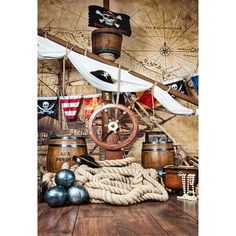 a painting of a pirate ship with ropes, barrels and other items on the table