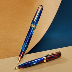 a fountain pen sitting on top of a table