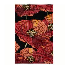 an orange and red flower pattern on black background, with large flowers in the center