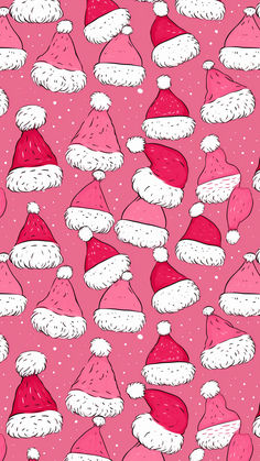 a pink background with santa hats on it