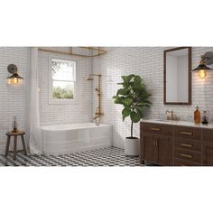 a white bathroom with black and white checkered flooring, gold fixtures and a potted plant in the corner