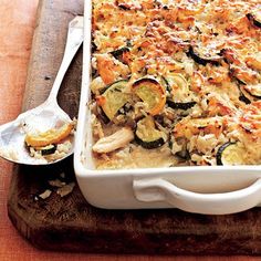 a casserole dish with zucchini and squash