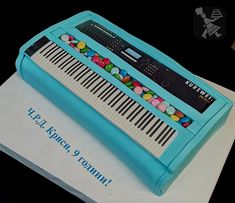 a cake that is shaped like an electronic keyboard