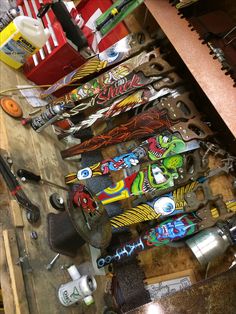 many skateboards are lined up on the floor