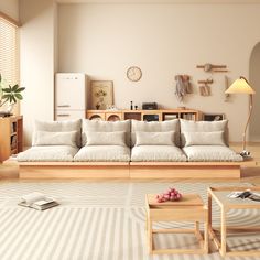 a living room filled with lots of furniture next to a wall mounted clock on the wall