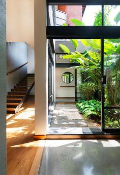 the inside of a house with glass doors