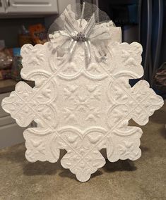 a white snowflake sitting on top of a counter