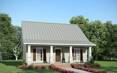 the small house is painted green and has red shutters