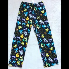 Hot Topic Pokemon Pajama/Lounge Pants - New! - Size Small (Please Check Measurements Below) - Adjustable Waist W/ Tie - Baggy - Black W/ Various Other Colorful Character Colors Involved W/ Pokemon - Cozy - Fashionable - Wear Them Out, You'll Get Compliments! **Non-Smokinghome!** Measurements: Waist - 27" (On Packaging), 32" When Measured All The Way Around W/ A Tape Measure, Unstretched) Hips - 19" (Laying Flat, Measured Side To Side) Inseam - 30.5" (Crotch To Ankle) Total Length: 42" (Waist To Black Sleepwear With Pockets In Long Pants Style, Multicolor Bottoms For Sleepover, Black Elastic Waistband Pants For Sleepover, Black Pants With Elastic Waistband For Sleepover, Black Bottoms For Sleepover, Black Long Pants For Pajama Party, Pokemon Pajamas, Pajama Lounge, Tape Measure