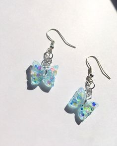 Blue Sparkly Butterfly Earrings Handmade Dainty Dangle Resin - Etsy Cute Resin Drop Earrings, Cute Iridescent Earrings For Gift, Whimsical Nickel-free Resin Earrings, Clear Hypoallergenic Resin Earrings, Hypoallergenic Clear Resin Earrings, Iridescent Resin Drop Earrings, Cute Iridescent Jewelry For Gift, Hypoallergenic Resin Dangle Earrings, Iridescent Dangle Resin Earrings