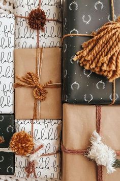 presents wrapped in brown and black paper with twine on them, tied up together