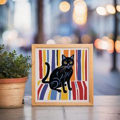 a black cat sitting on top of a wooden frame next to a potted plant