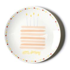 a birthday cake plate with candles on it