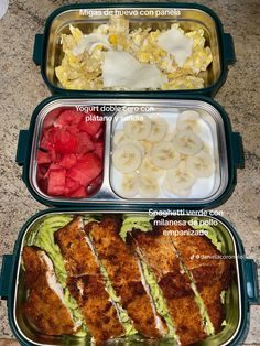 two plastic containers filled with food on top of a table