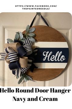 a round door hanger that says, hello round door hanger navy and cream