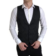 Discover Elegance And Sophistication With Our Exquisite Single-Breasted Dress Vest By Dolce & Gabbana. Tailored From A Luxurious Blend Of Fabrics, This Vest Ensures A Sharp Silhouette For Any Formal Occasion. Its Sleek Black Color Is Versatile And Timeless, Designed For The Discerning Gentleman Who Appreciates The Finest In Fashion Craftsmanship. Radiate Confidence At Your Next Event With This Essential Piece Of Sartorial Elegance. Color: Black Material: 56% Polyester, 25% Acetate, 17% Viscose, Black Formal Dress Men, Dress Suit Vest, Formal Dresses For Men, Men Vest, Dolce Gabbana Jacket, Black Formal Dress, Formal Vest, Formal Men, Dress Vest