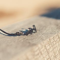 Command the ocean's depths and your personal style with our Black Edition Great White Shark Clasp Bracelet. This monochrome masterpiece celebrates the power and grace of the great white shark, an iconic species that symbolizes strength and majesty. Purchase with Purpose: 15% of all profits are directly donated to the Atlantic White Shark Conservancy. Through your purchase, you're supporting crucial research and education about this important marine species. Features: Shark clasp measures approxi Shark Bracelet, Marine Species, Ocean Depth, Plastic Sunglasses, The Great White, Clasp Bracelet, White Sharks, Great White Shark, Great White