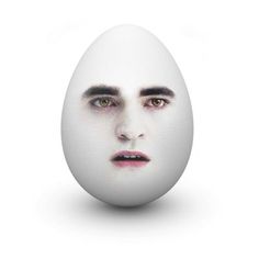 an egg with a man's face painted on it, as if in the movie twilight