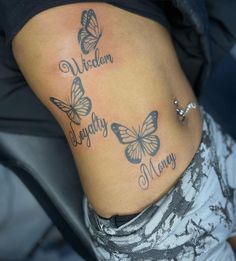 a woman's stomach with two butterflies on it and the words, we can only fly