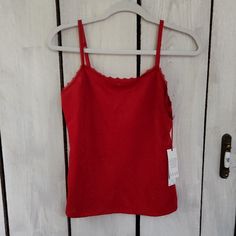 Brand: Elle Size: Women's Small Color: Basic Red Material: Front 100% Polyester Back: 60% Cotton 40% Modal Lining: 100% Polyester Red Fitted Lace Camisole, Red Seamless Camisole Tank Top, Red V-neck Camisole For Sleep, Red Summer Camisole With Built-in Bra, Red Stretch Camisole With Built-in Bra, Lace Camisole, Womens Tops, Lace, Women Shopping