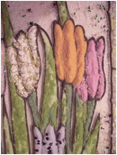 three different colored tulips are depicted in this artistic art work on the side of a wall