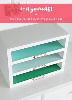 an open drawer with the words do it yourself paper sorting organizer in front of it