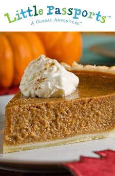 a slice of pumpkin pie with whipped cream on top sits on a plate next to some orange pumpkins