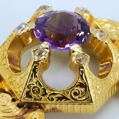 Beautiful, Victorian bracelet. Amethyst and diamonds set in gorgeous ornate 18k gold. With safety chain Amethyst 10.12 mm x 5.7 mm ~2.55 ct Six ~2mm Diamonds Diamonds are old mine cut, except one is table cut. Width of links 10.12 mm Thickness of links 4.52mm Max with of center 25.29 mm Max height at center 12.28 mm Total weight of bracelet 0.833 Oz (25.02 g) This item is antique. It has been cherished, used, and preserved by possibly many over the decades and even centuries of its unique existe Victorian Yellow Gold Bracelet, Victorian Amethyst Gemstone Jewelry, Victorian Gold Bracelets With Cabochon, Victorian Gold Bracelet Collectible, Victorian Yellow Gold Collectible Bracelet, Victorian Bracelet, Unique Rings Vintage, Carnelian Bracelet, Antique Bracelets