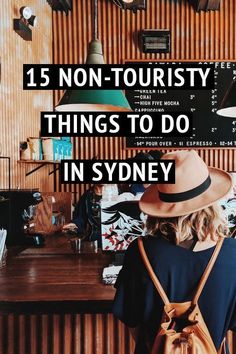 a woman standing in front of a wooden wall with the words, 15 non - touristy things to do in sydney