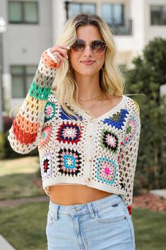 You'll be ready for dreamy days in the sun when you've got the Vibrant Crush Ivory Crochet Knit Top! This top features an array of bright, cheerful colors woven into an intricate crochet knit pattern, creating a unique, eye-catching design that adds texture and personality to any outfit. The button-front style offers versatility and ease of wear, allowing you to style it open over a tank or buttoned up for a more polished look. Crafted from soft, breathable yarn, this top provides comfort while Crochet Knit Top, Intricate Crochet, Brunch Dress, Casual Kimono, 4th Of July Outfits, Rust Dress, Puff Sleeve Dresses, Crochet Tops, Casual Jumpsuit