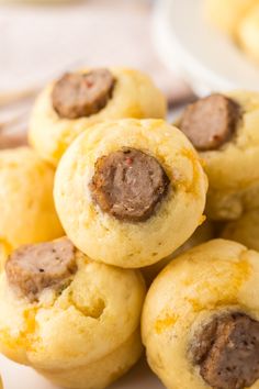 Pile ]of pancake sausage bites on a white plate. Pigs In A Blanket Sausage Pancake, Sausage Pancake Bites, Breakfast Munchies, Sausage Pancakes, Pancake Sausage, Sausage Bites, Best Brunch Recipes, Pancake Bites, Pork Recipes Easy