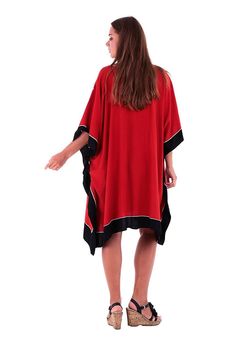 Enjoy this short caftan cover-up. It is ideal for wearing around the house, dressing it up to go out to lunch, or even making a statement on your vacation, or cruise. Easy to wear with endless possibilities. length 38” width 43” Made from 100% soft Rayon Hand-painted design Hand wash in cold water, hang to dry Short Sleeve Relaxed Fit Tunic For Beach, Relaxed Fit Short Sleeve Tunic For Beach, Oversized Short Sleeve Kaftan For Beach Cover-up, Oversized Short Sleeve Kaftan For Beach, Short Sleeve Relaxed Fit Kaftan For Beachwear, Beachwear Kaftan With Short Sleeve And Relaxed Fit, Beachwear Kaftan With Short Sleeves In Relaxed Fit, Beachwear Style Kaftan With Short Sleeves, Short Sleeve Poncho For Vacation