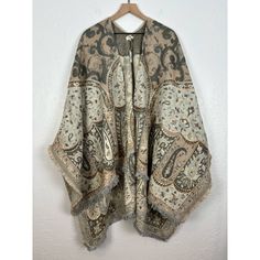 World Market Paisley Embroidered Poncho Nwt One Size New With Tags! Dry Clean Only. 45% Acrylic / 35% Cotton / 10% Polyester / 10% Viscose. One Size Length 33/45" Sku# 594366 Smoke Free, Pet Friendly Home. Tt2447 One Size Embroidered Poncho For Fall, Embroidered One Size Poncho For Fall, Fall Long Sleeve Embroidered Poncho, Embroidered Long Sleeve Fall Poncho, Embroidered One-size Poncho For Fall, Bohemian Pashmina Shawl With Paisley Print, Embroidered Poncho For Fall, One Size, Fall Paisley Print Pashmina Shawl, Fall Paisley Print Shawl