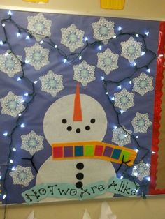 a bulletin board with a snowman on it