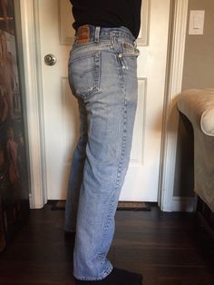 "Levi 501 Jeans in great condition, circa 1980. Medium wash blue size 32x32 men's jeans. Very light wear, great vintage look. Light fading give the jeans a great vintage look. Four button up. Somewhat smaller as they are vintage and have been washed. Approx. 31\" x 29\"" 501 Levis Jeans Light Wash, Cheap Levi's Men's Tops, Levis 501 Men, Levi 501 Jeans, Levi 501, Blue Jeans Mens, Star Sweater, 501 Jeans, Levi’s 501