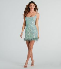 The iconic style of the Angie feather trim sequin formal mini dress will level up your formal look! She features a sleeveless square neckline, adjustable spaghetti straps for a customized fit, a flirty open back with a lace-up strappy design, a mini-length hem with a fabulous marabou feather trim, and a slim-fit silhouette. The lined mesh fabric features iridescent sequin embroidery in a gorgeous scroll pattern. Complete your look for HOCO or a dressy party with metallic heels!Fit & FeaturesSleeveless square neckline, adjustable spaghetti strapsOpen back, lace-up strappy design, tie closureHigh waist seam, lower back zipper, hook and eye closureMini-length hem, marabou feather trim, slim-fit silhouetteIridescent sequin embroidery, scroll patternSheer mesh fabric, full-length knit linin Fitted Sequin Feather Dress For Prom, Fitted Sequin Dress With Feather Trim For Prom, Prom Sequin Dress With Feather Trim And Fitted Design, Fitted Sequin Prom Dress With Feather Trim, Mini Dress With Feather Trim For Homecoming, Evening Feather Trim Mini Dress For Prom, Evening Mini Dress With Feather Trim For Prom, Glamorous Feather Trim Mini Dress For Prom Season, Feather Trim Mini Dress For Prom