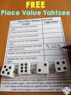 two dices are on top of a piece of paper with the word place value yaht