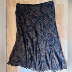 Nwt Ralph Lauren Silk Skirt Bobo Brown Paisley Midi Skirt Size Medium In Excellent Condition Nwt, Elastic Waist Band, Skirt Has Some Stretch To It, Very Flowy And Light Weight, Double Lined! Paisley Midi Skirt, Ralph Lauren Fitted Skirt With Lining, Fitted Ralph Lauren Lined Skirt, Ralph Lauren Fitted Lined Skirt, Ralph Lauren Fitted Skirt, Casual Lined Skirt By Ralph Lauren, Elegant Brown Tiered Skirt Bottoms, Elegant Brown Tiered Skirt, Elegant Fitted Paisley Print Skirt