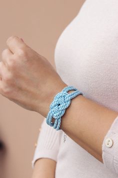 Delicate light blue summer knot bracelet created from decorative twisted rope and clasp in silver tone metal. Perfect jewelry for everyday wear! Length: 17 -18 cm + 6 cm of chain (If you need other size,please,let me know). A wonderful jewelry and a great gift! I made it in a smoke-free and pet-free invironment. Other bracelets of my shop you can see here: https://www.etsy.com/shop/NaTavelli?section_id=13470528 Thanks for your visit! Adjustable Blue Nautical Bracelets, Adjustable Blue Nautical Bracelet, Nautical Style Blue Bracelets For Beach, Blue Braided Bracelet For Beach, Adjustable Blue Nautical Jewelry, Adjustable Nautical Blue Jewelry, Nautical Blue Bracelets As A Gift, Nautical Blue Bracelets For Gifts, Blue Nautical Bracelets As Gifts