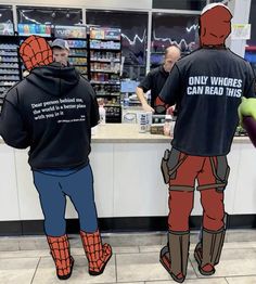 two men in spider - man costumes are standing at the checkout counter and talking to each other