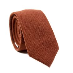 We pride ourselves in offering our customers some of the best skinny ties money can buy. Each DAZI tie is handmade from high quality imported fabrics. Features: Approx. 2.5" wide at the tip Approx. 58" in length 50% Cotton, 50% Linen Don't forget a matching pocket square! Shop our Rust Pocket Square. Groomsmen Ties, Brown Tie, Wedding Groomsmen, Cool Ties, Wedding Ties, October Wedding, Groom And Groomsmen, Rust Color, Fabric Swatches