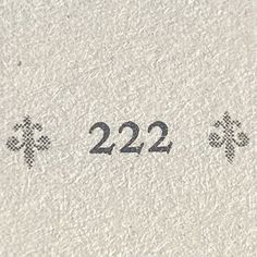 the numbers are written in black and white on a piece of paper that says, 22 / 22