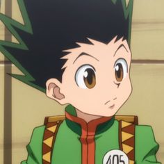 an anime character with black hair and green outfit looking at the camera while standing in front of a wall