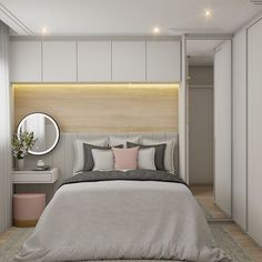 a bedroom with a bed, dresser and mirror in the corner that is lit by lights