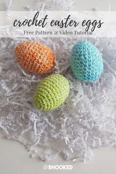 three crochet easter eggs sitting on top of white shredded paper with text overlay that reads, crochet easter eggs free pattern and video