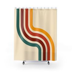 a shower curtain with colorful stripes on the bottom and sides, in front of a white background