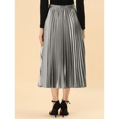 Accordion pleats enhance the dimension and movement of this midi skirt, while the metallic design underscores its sleek style. It's pleated all around for this trending midi skirt. Feel free to pair it with black block-heel sandals. Whether you're dressing up or down, this skirt is perfect for any occasion. A casual and simple style, never out of fashion, is a must-have item in your wardrobe. This fashionable and trendy clothes for women can not only be worn daily, but can also be easily matched Knee-length Pleated Waist Party Bottoms, Knee-length Party Bottoms With Pleated Waist, Long Party Skirt With Folds, Long Skirt With Folds For Party, Metallic Lined Flared Skirt, Chic Metallic Flowy Skirt, Chic Flowy Metallic Skirt, Spring Party Skirt With Folds, Metallic Flared Skirt For Spring