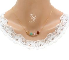 ♦♦If not automatically prompted to do so, please enter your birthstone choices by MONTH, in the EXACT order you want them placed on the necklace, into the NOTES TO SELLER box that is on the check-out page.♦♦ ----------------------------------------------------------------------------- ♥♥ Designed By Us, Treasured By You... ♥♥ Original design ©2011 KyKys Treasures. All Rights Reserved. ♥♥This gold birthstone necklace arrives ready for gift giving in a pretty, bow-tie jewelry box. And unlike many Elegant Holiday Necklaces For Celebrations, Elegant Gold Necklace For Holidays, Gold Jewelry For Anniversary And Holidays, Gold Jewelry For Anniversary Holiday, Gold Jewelry For Anniversary And Holiday, Gold May Birthstone Necklace For Wedding, Gold Birthstone Necklace For May Wedding, Elegant Gold Jewelry For Holidays, Elegant Gold Jewelry For Holiday